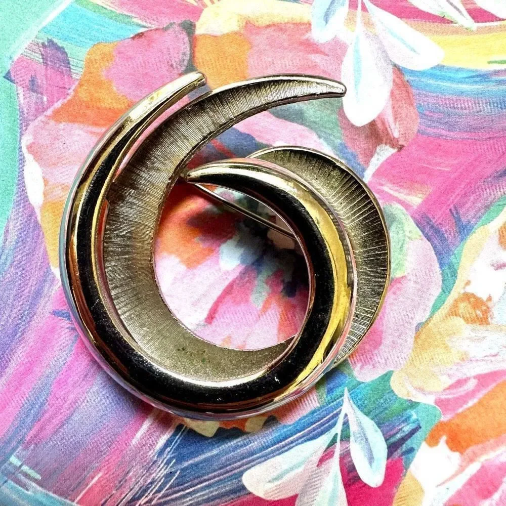 Trifari vintage silver tone swirl brooch